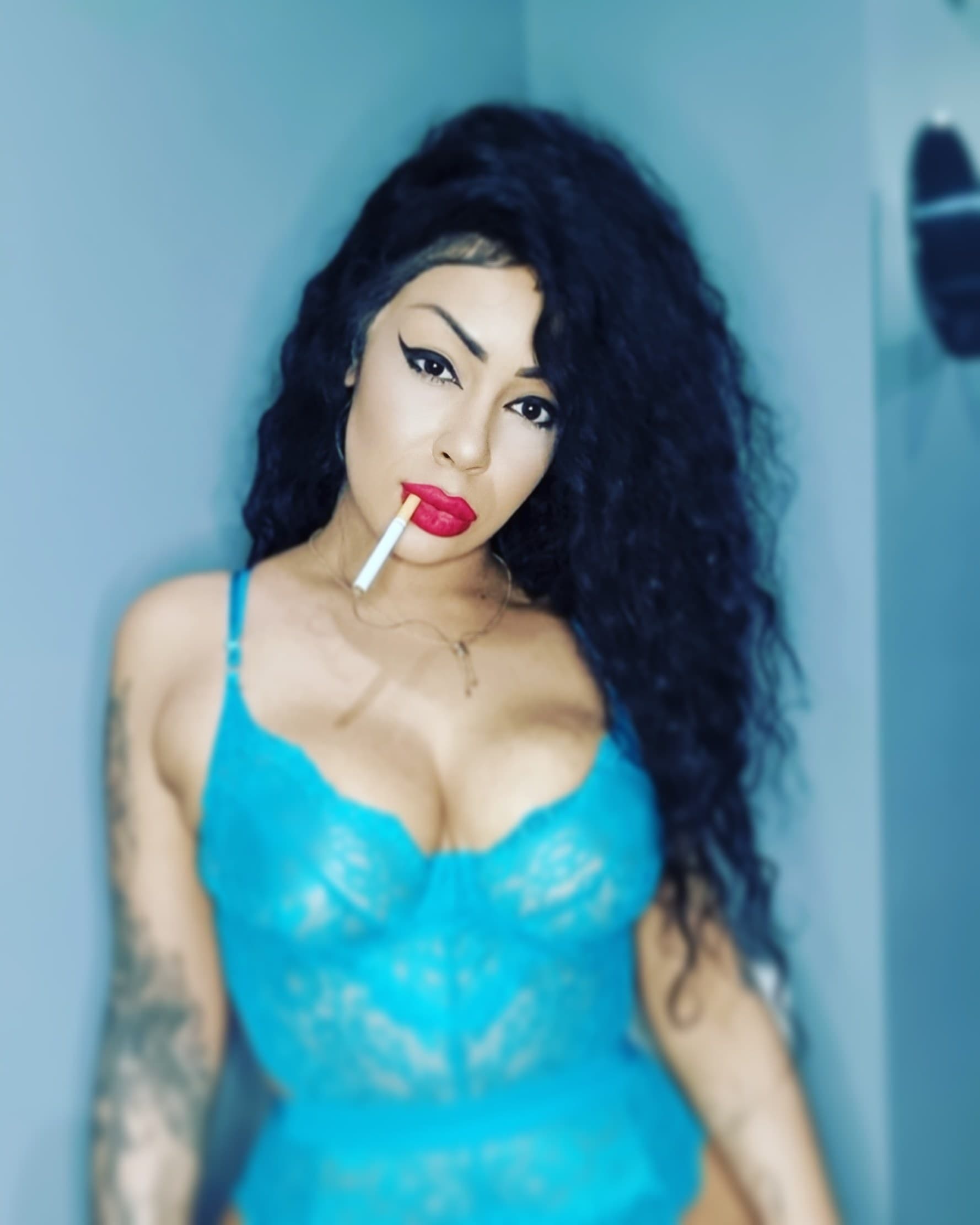 SheSmokesOnHerThrone banner image